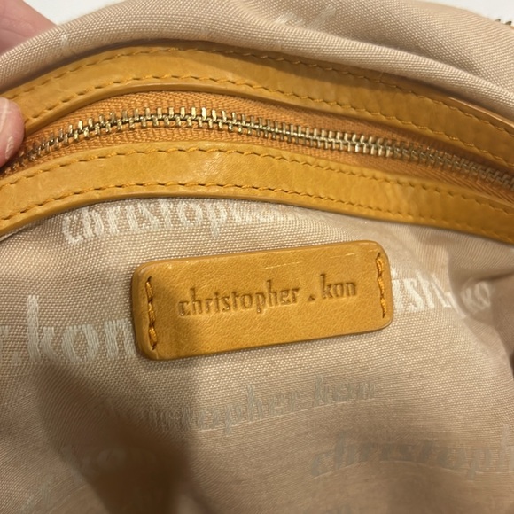 Handbag by Christopher Kon, Butterscotch leather. 15.5” w, 14.25” l, 1” d, - Picture 8 of 11